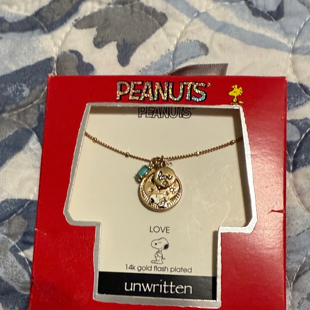 Unwritten Peanuts Gold tone Necklace with Turquoise Charm
